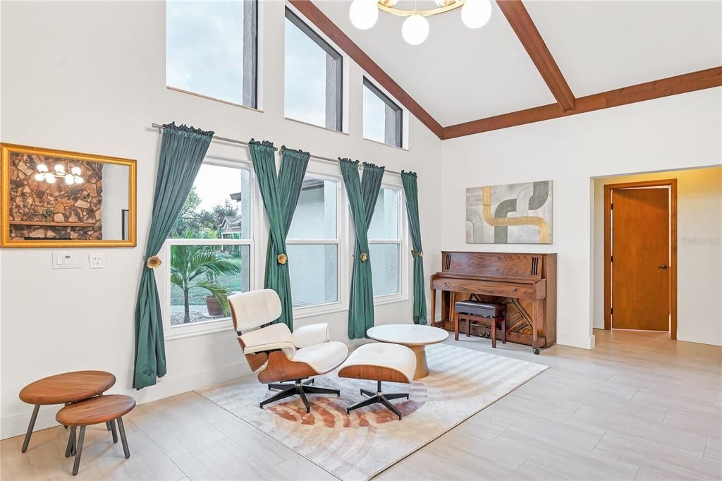 Large windows bring in an abundance of natural light throughout the great room.