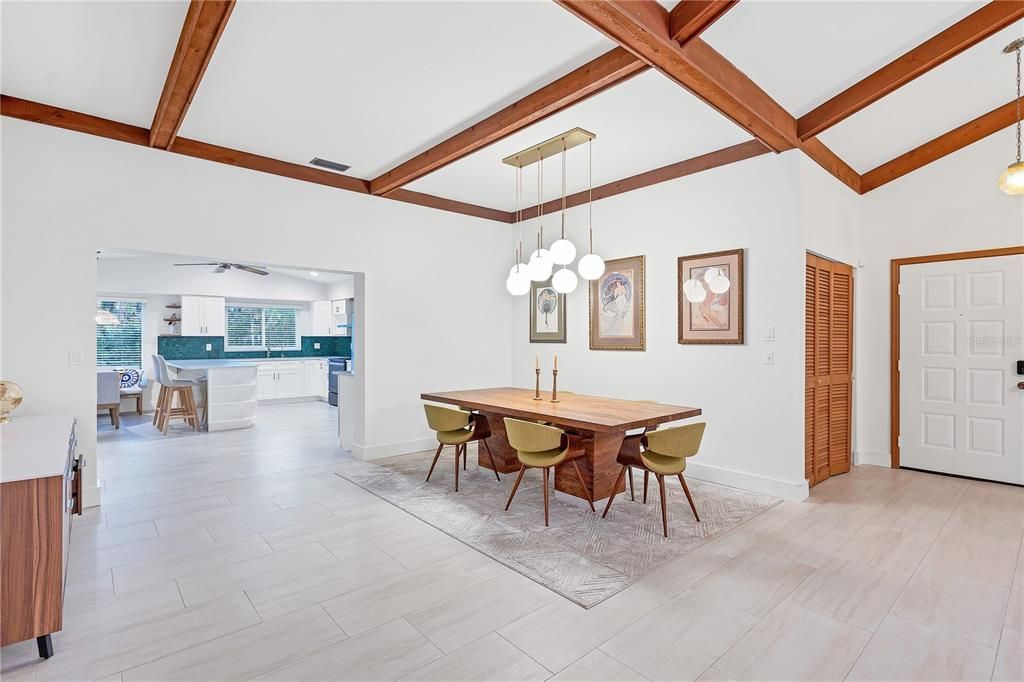 Dining room is situated in between the living room and Kitchen