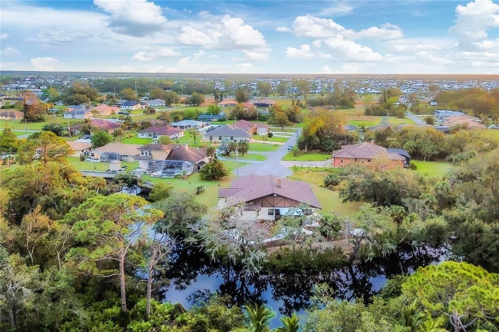 Aerial showing how the Myakka River wraps around the home.