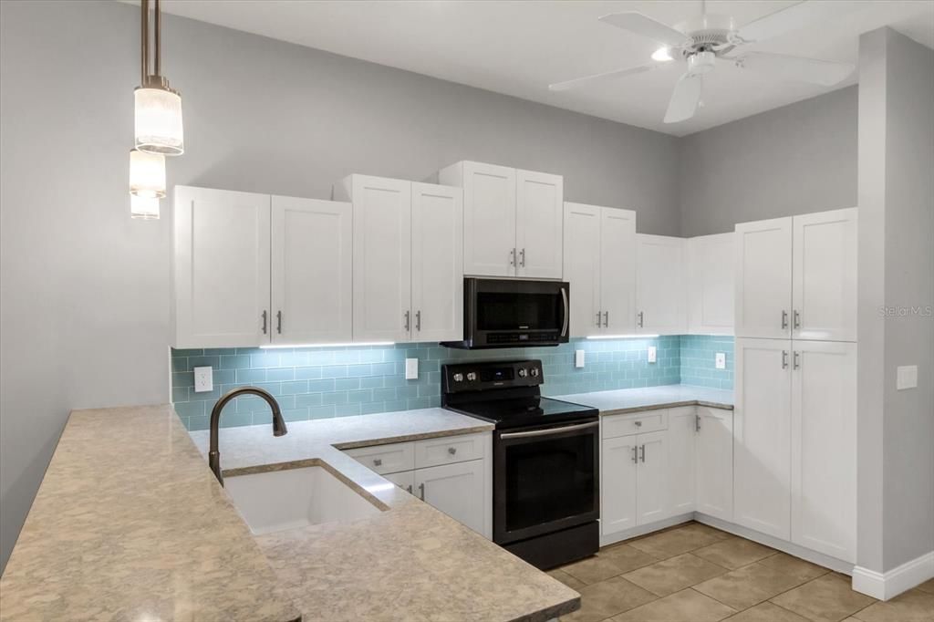 Kitchen close-up + Quartz countertops + Seaglass backspla