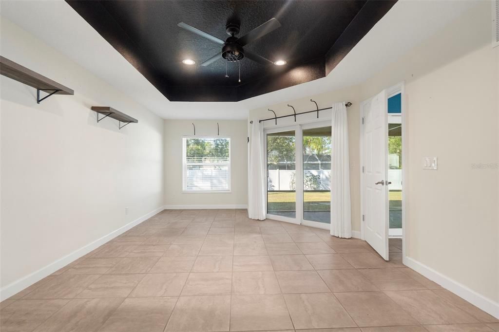 Primary bedroom with access to the screened in lanai.