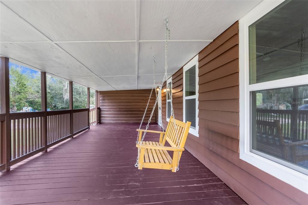 Large front porch with porch swing to enjoy your morning coffee or a book!