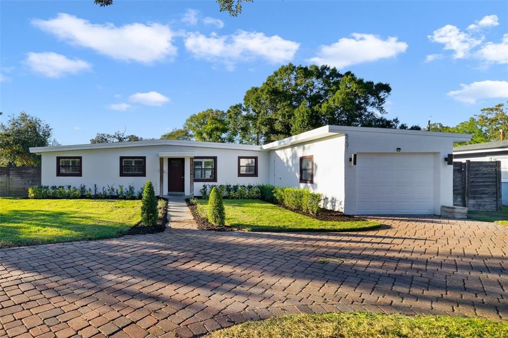 Mid century modern charm and a **RENOVATED** 3BD/2BA **POOL HOME** with a NEW ROOF (2021), UPDATED ELECTRICAL (2021), NEW WATER HEATER (2021), NEW A/C (2023) and UPDATED PLUMBING (2023) all on an OVERSIZED .22 ACRE **CORNER LOT** with NO HOA and zoned for TOP-RATED SCHOOLS!