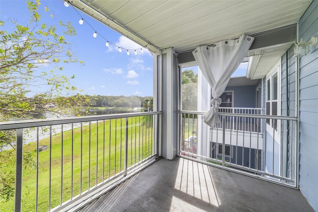 Sip your morning coffee on the SCREENED BALCONY with a WATER VIEW you’ll love starting the day with.