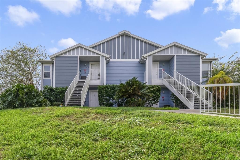 Welcome to your UPDATED second floor 2BD/2BA unit complete with a NEWER A/C (2020), UPDATED KITCHEN, VAULTED CEILINGS, OUTDOOR SPACE and LAKE VIEWS!