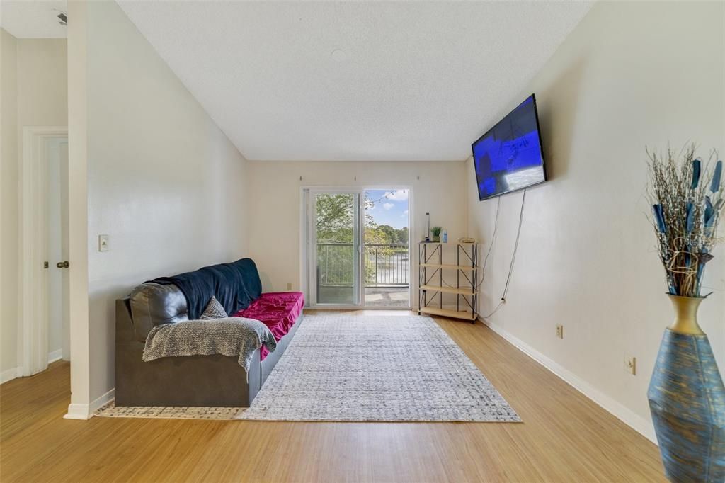 Nestled in Lake Mary’s highly sought-after GATED LAKEFRONT COMMUNITY of Regency Park the new owner will enjoy a light and bright open layout with WOOD LAMINATE FLOORS throughout, spacious bedrooms, NEW WINDOWS/SLIDER and there is convenient IN-UNIT LAUNDRY.