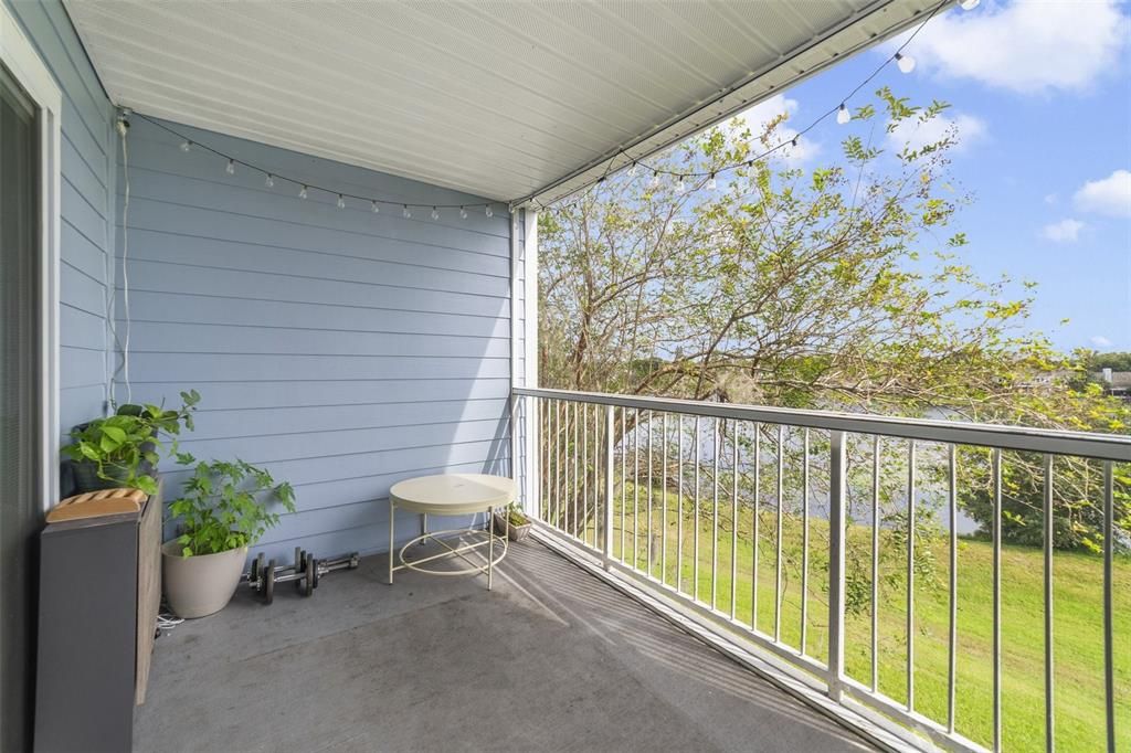 SCREENED BALCONY HAS LAKE VIEWS!