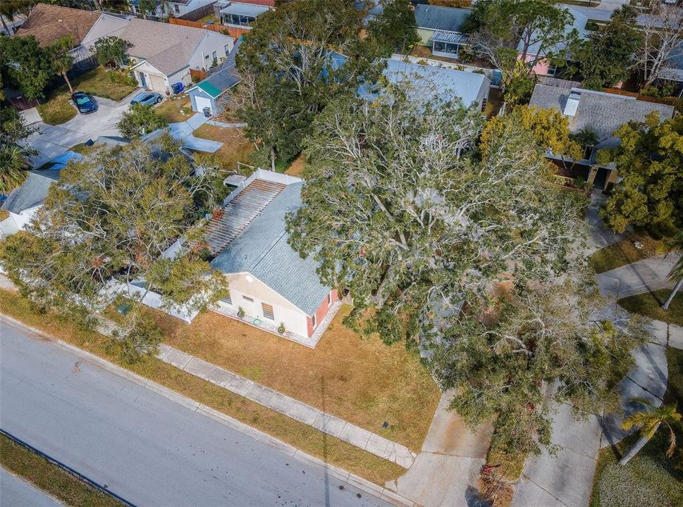 Aerial view of property on corner lot