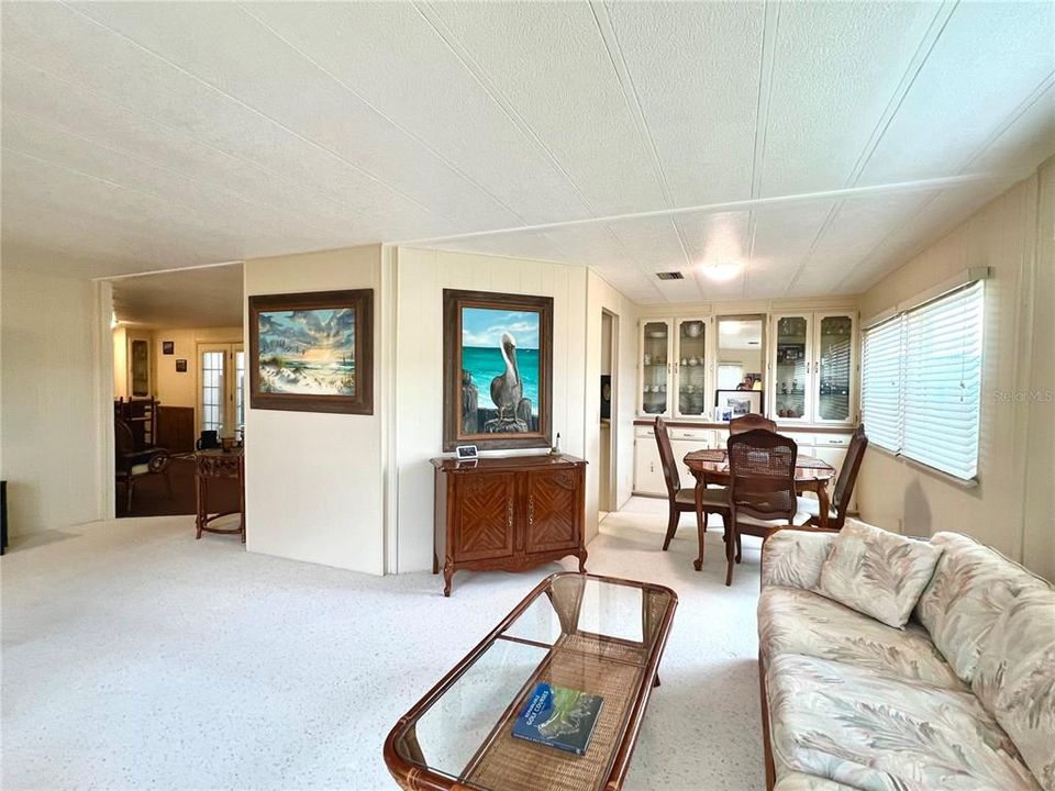 spacious living room open to dining area