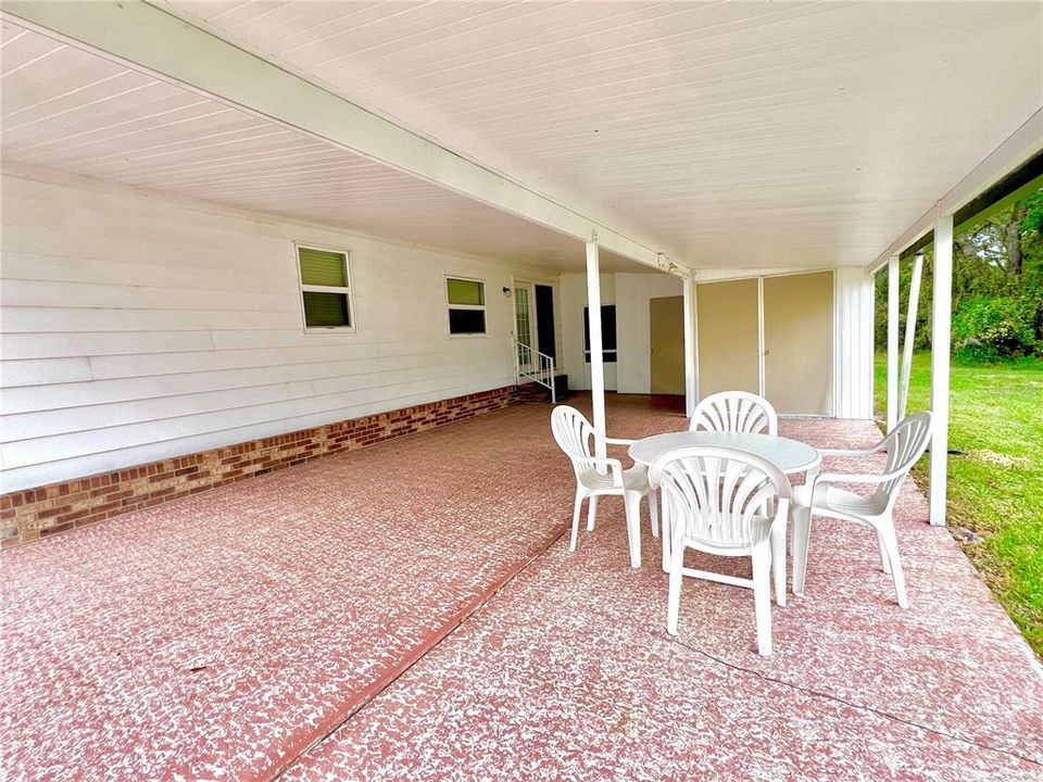 Oversized carport w/ attached boat port