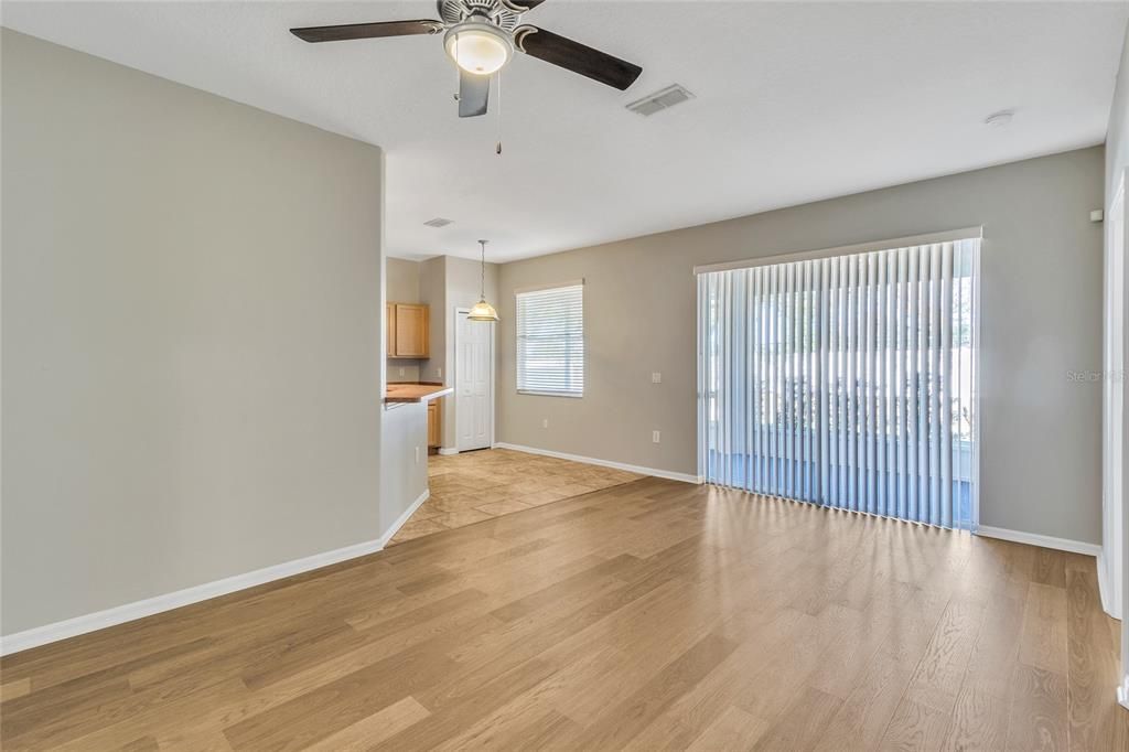 Family Room- Great natural sunlight, sliding glass doors and lanai blending indoor and outdoor space