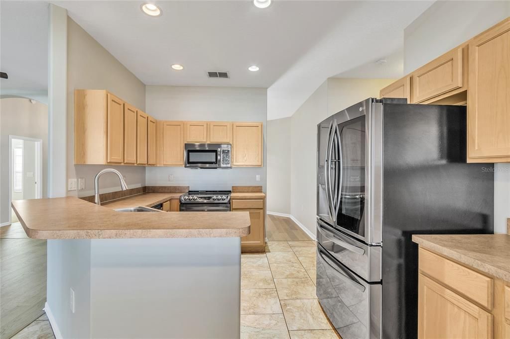 Kitchen with high end & newer stainless appliances - Dishwasher(2022), Refrigerator, stove & Microwave(2020)