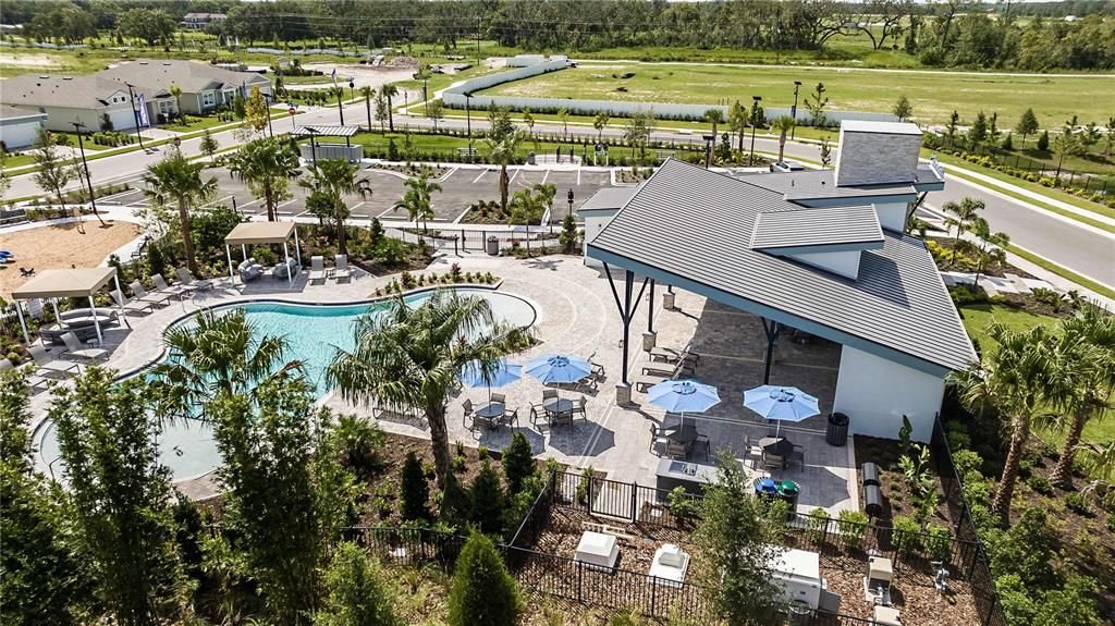 Aerial Side of Pool Area With Seating