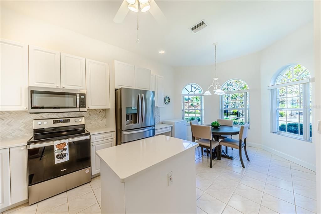 New Appliances, Quartz countertops, Custom backsplash to Dinette