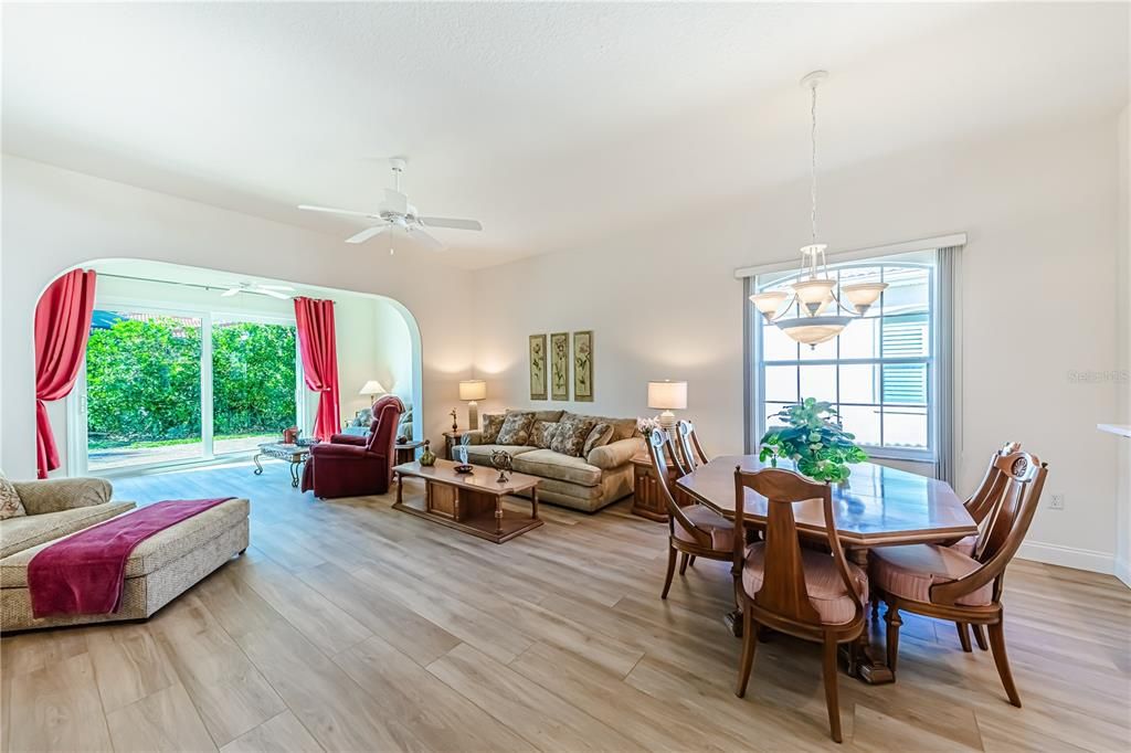 Dining room to Living room out to new paver patio (2024)