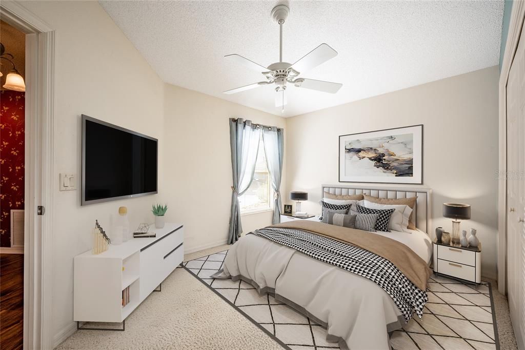 The second bedroom is situated off the foyer with its own en-suite bath. Virtually Staged.