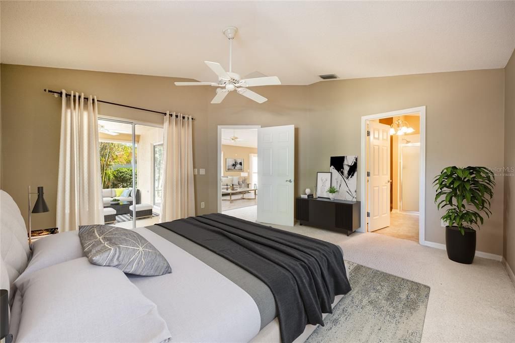 The desirable SPLIT BEDROOM FLOOR PLAN puts your generous PRIMARY SUITE at the back of the home complete with a vaulted ceiling, direct access to the lanai, WALK-IN CLOSET and a private en-suite bath. Virtually Staged.