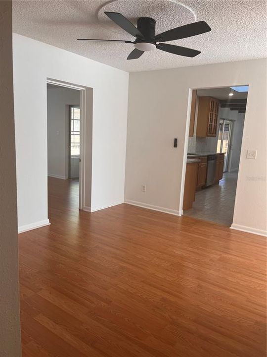 Hall connecting Living/Family room, Bedroom 3 and Kitchen Kitchen with Granite Counters