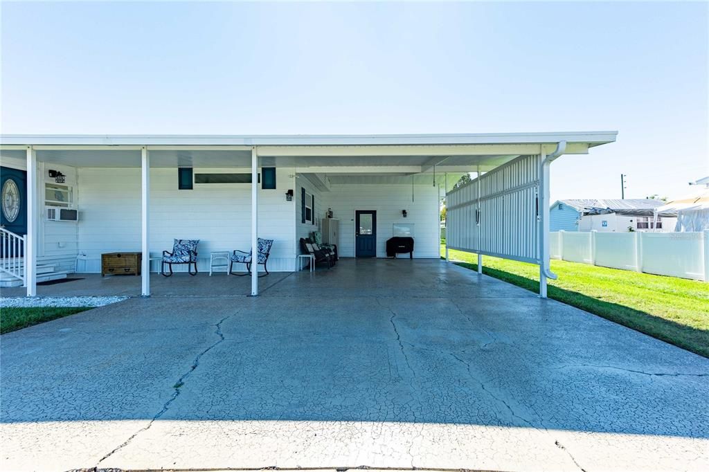 Workshop is in back of double carport.