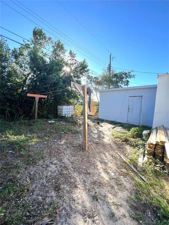 BACK YARD, STORAGE SPACE AND LAUNDRY ROOM