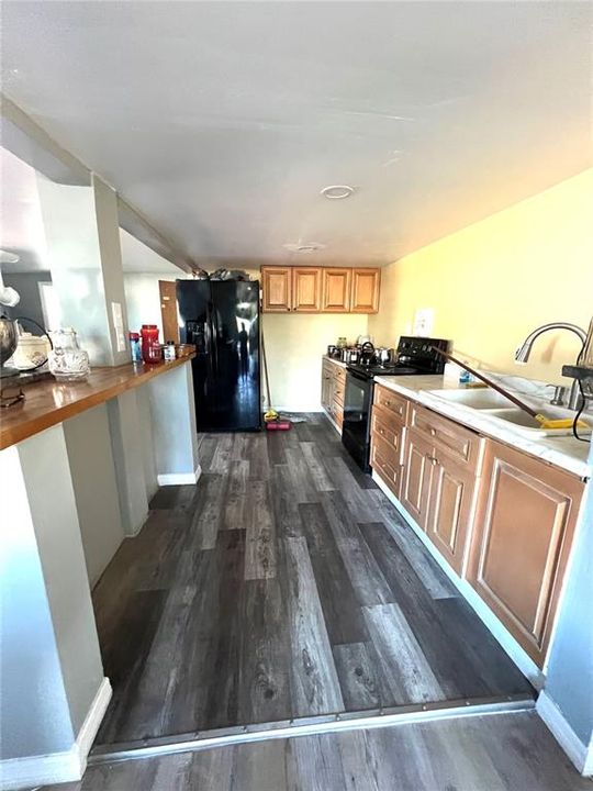 KITCHEN VIEW FROM LIVING ROOM