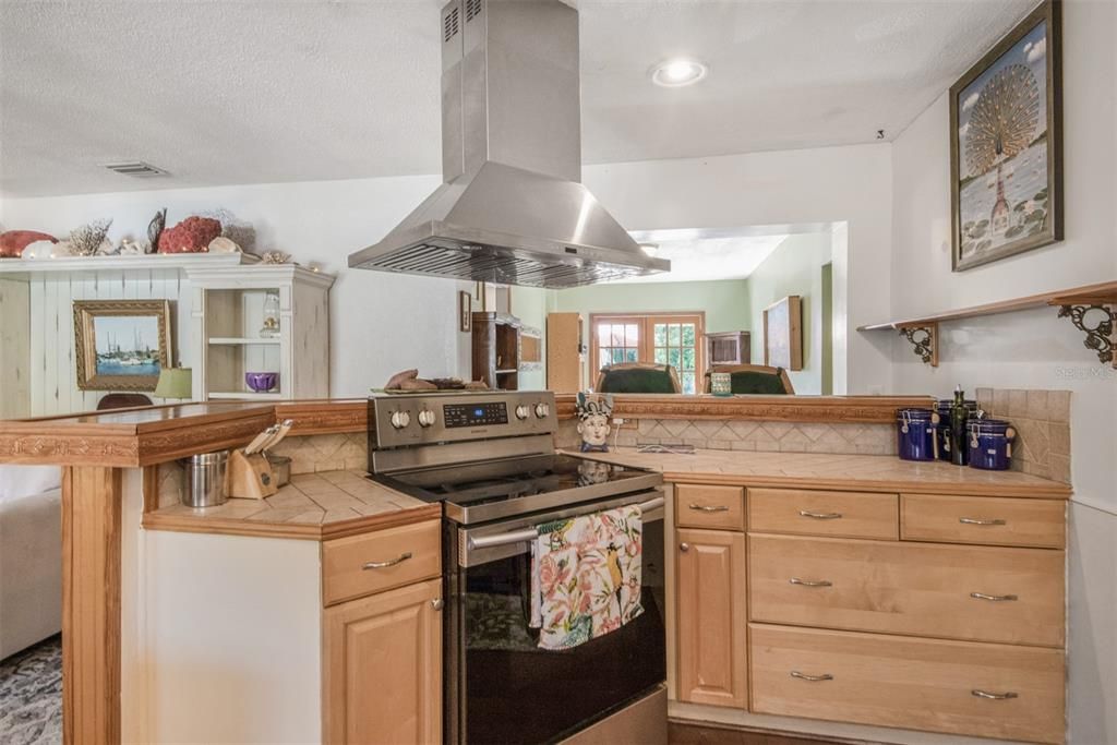 Nicely Appointed Kitchen Wood Cabinets & Tile Tops