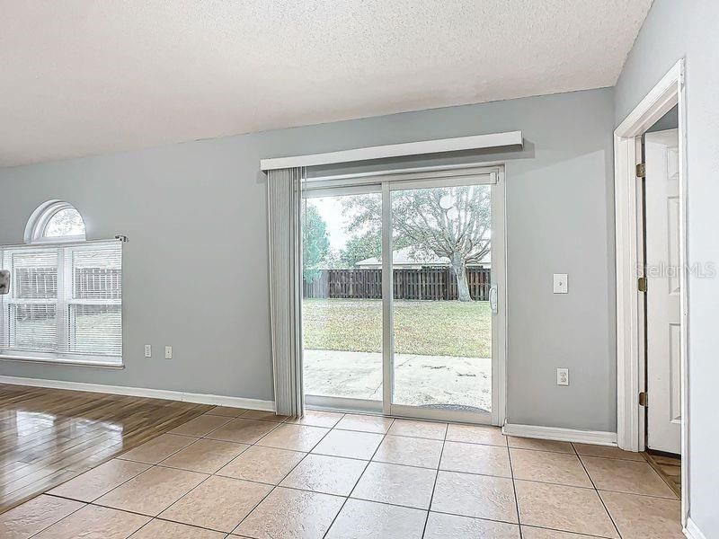 Kitchen nook : Ceramic tile flooring and sliders to rear patio