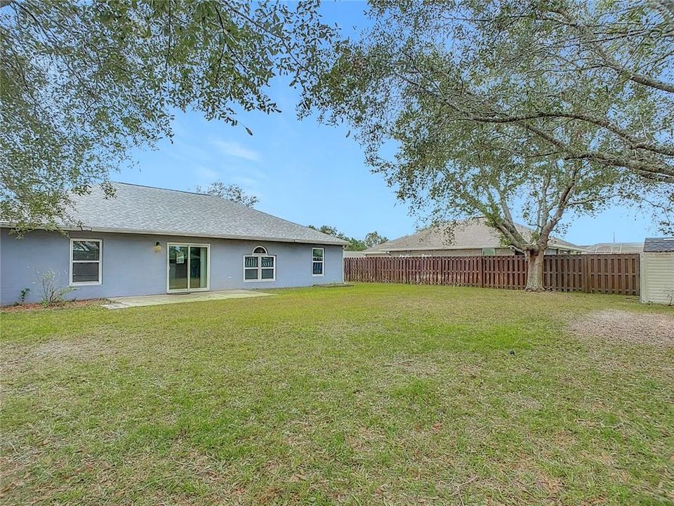 Rear Yard. Concrete patio and fully fenced yard