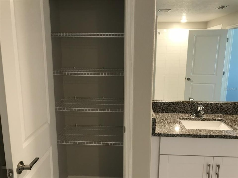 Linen Closet in Primary Bath