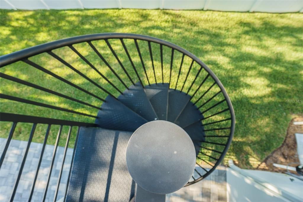 Spiral Staircase to yard and pool area