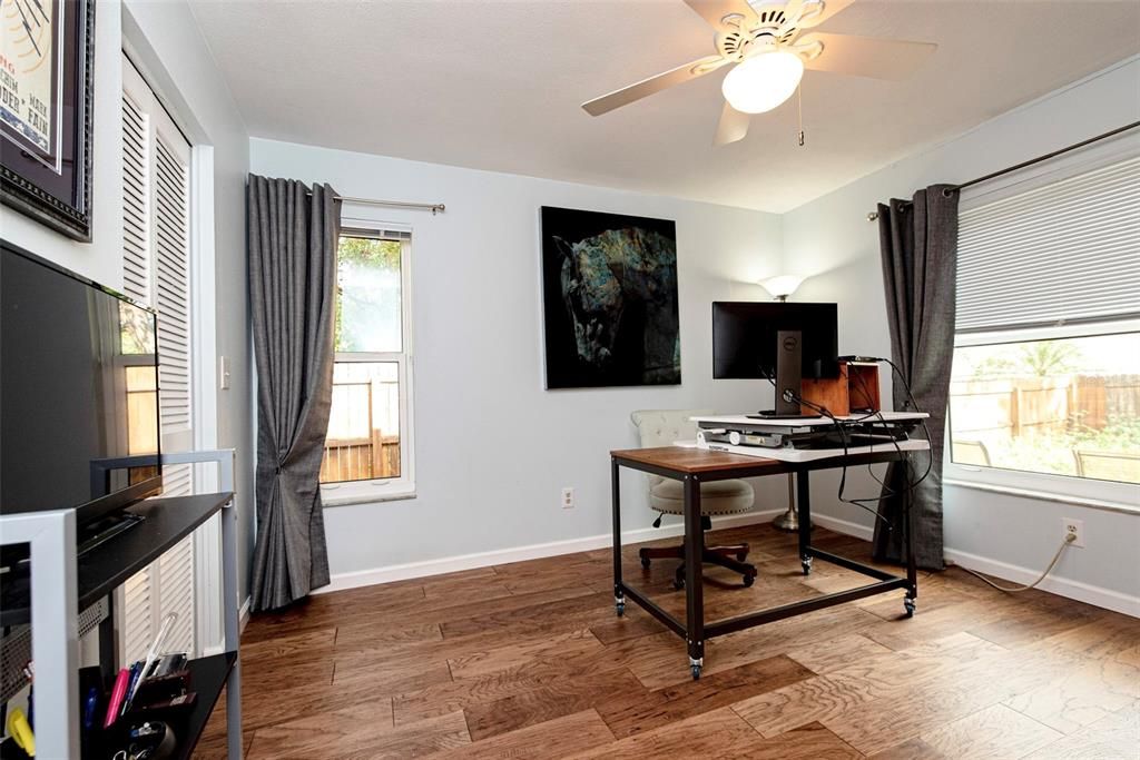 Guest bedroom is being used as an office.