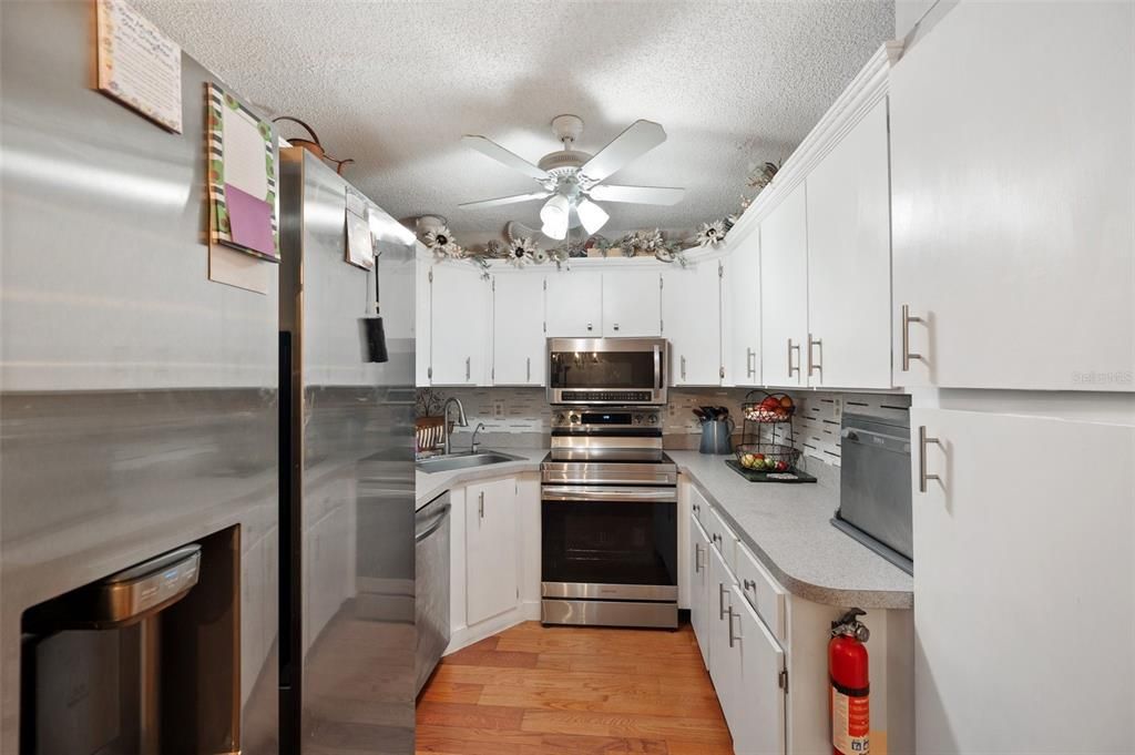 Stainless steel appliances in Kitchen