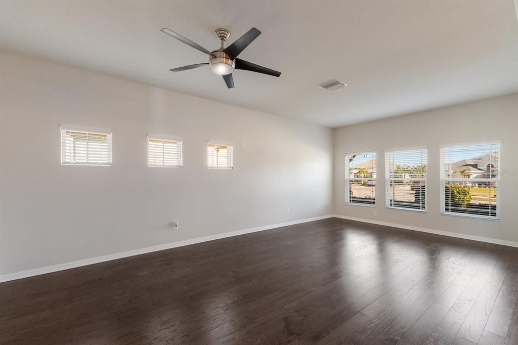 Dining/Living Room with easy care, wood look, laminate flooring.