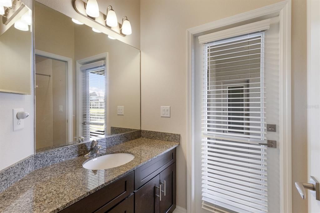 Bathroom 2 offers direct lanai access.  Ideal for future pool bath.