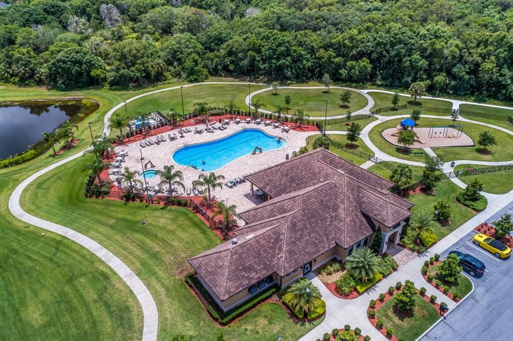 Second community pool with nearby playground.