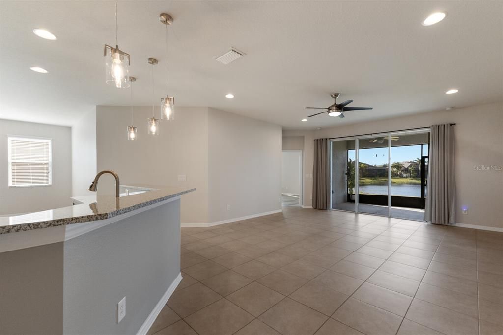 Great room open to kitchen and dinette space.