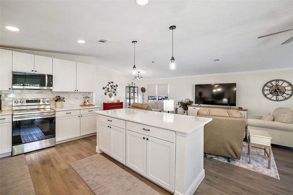 Beautiful and functional prep island with breakfast bar.