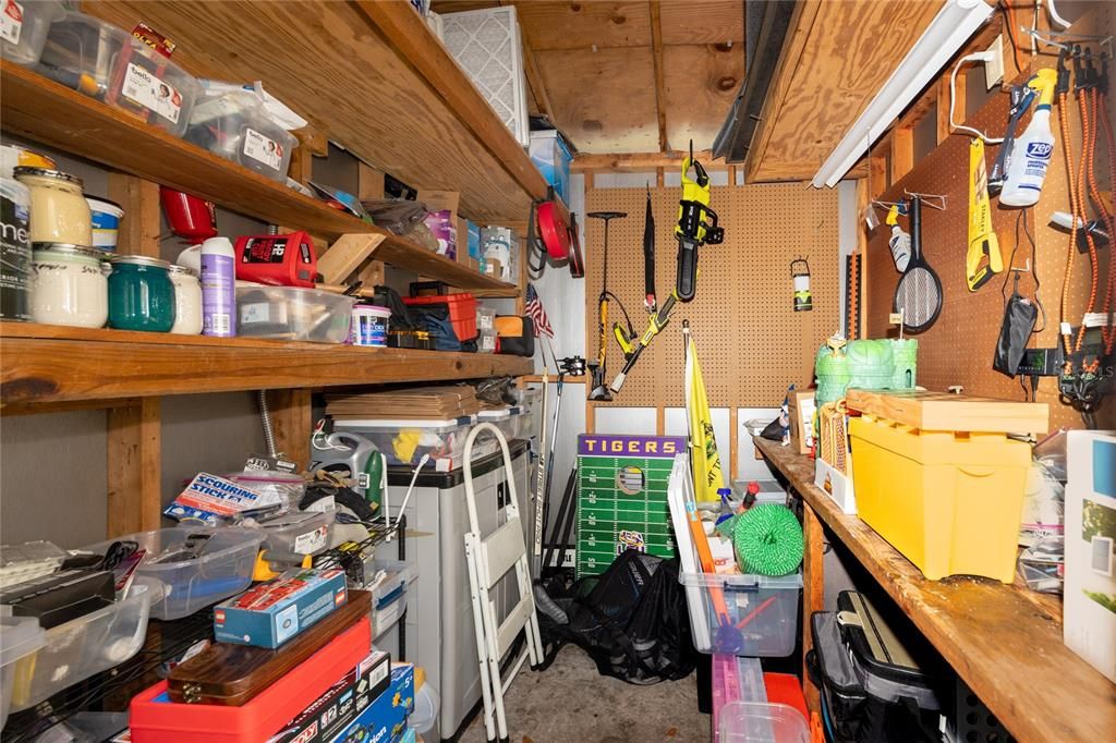 Shed in backyard conveys. Vented to allow air circulation.