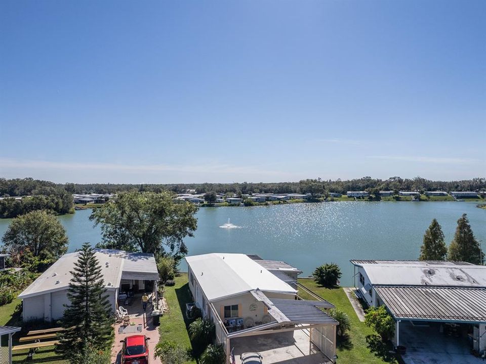 Ariel of home with lake view.