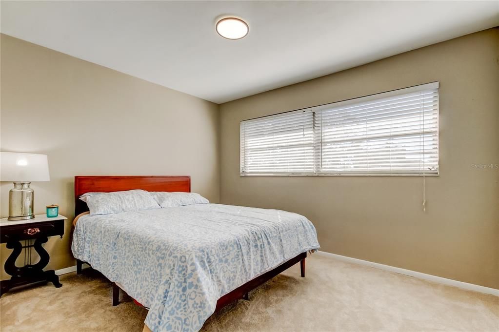 41. Bedroom #1 (10.2' x 14.4') Offers a HUGE Closet, NEW Plush Carpet, & Plenty of Light & Spaciousness...