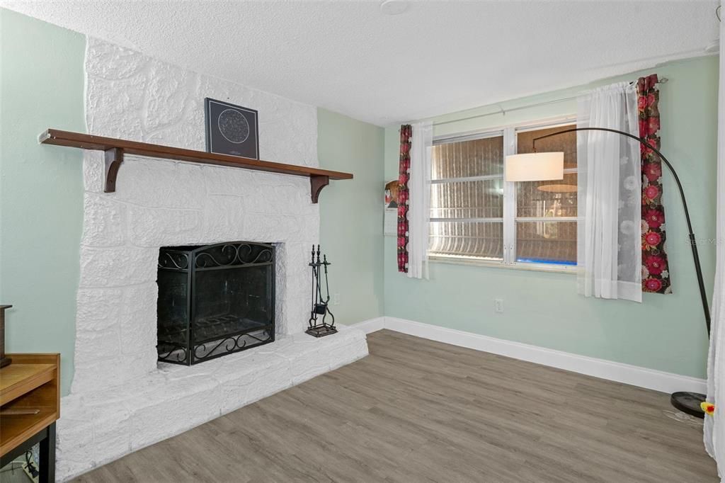 Family Room with Stone Wood Burning Fireplace