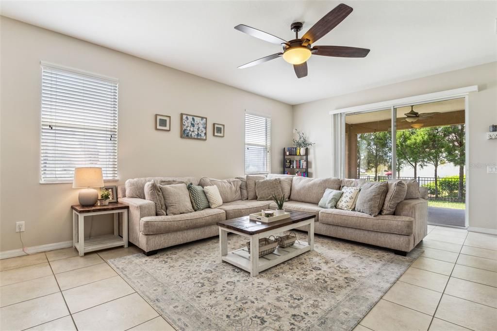 Living Room with view of sliding glass doors to Covered Patio