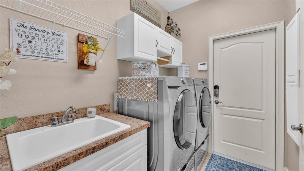 spacious laundry with built in sink