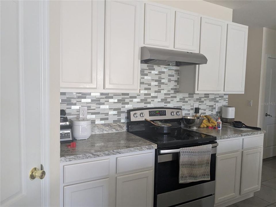 beautiful kitchen with breakfast bar