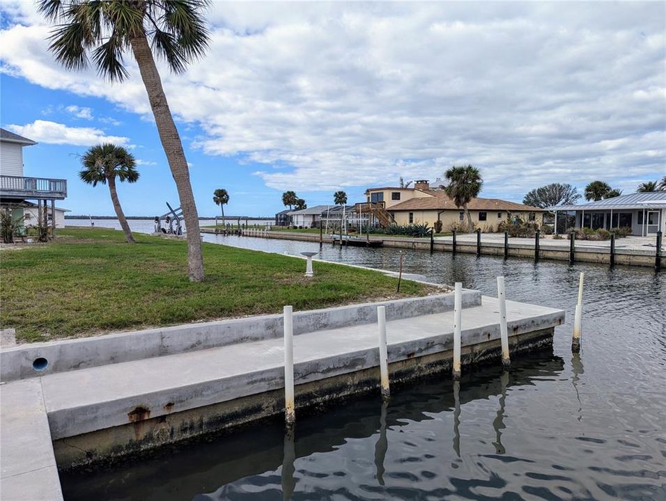 New Sea Wall cap in 2023. Cleared, level lot has water and sewer currently.