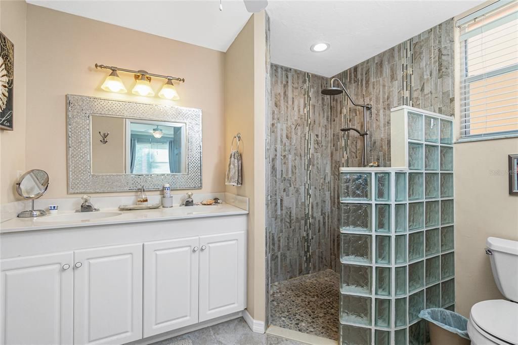 Master bathroom with large walk-in shower.