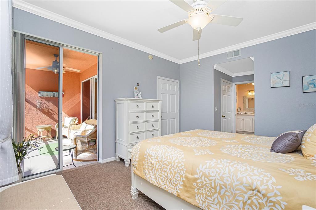 Master bedroom; patio door to the lanai.