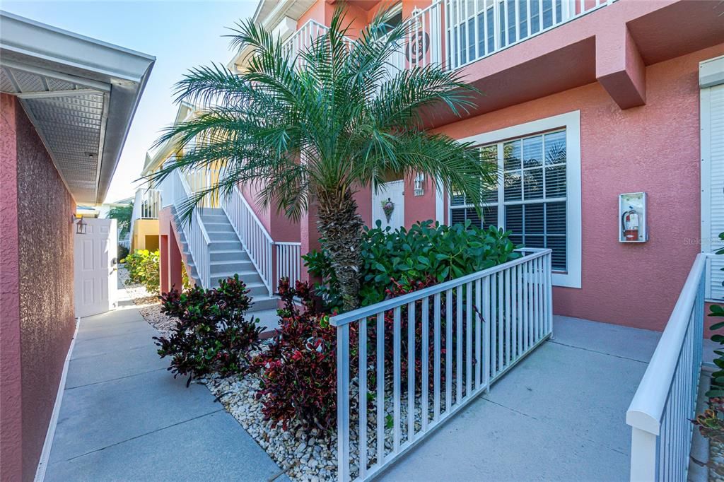 Walkway behind the garage leading to Unit #811.