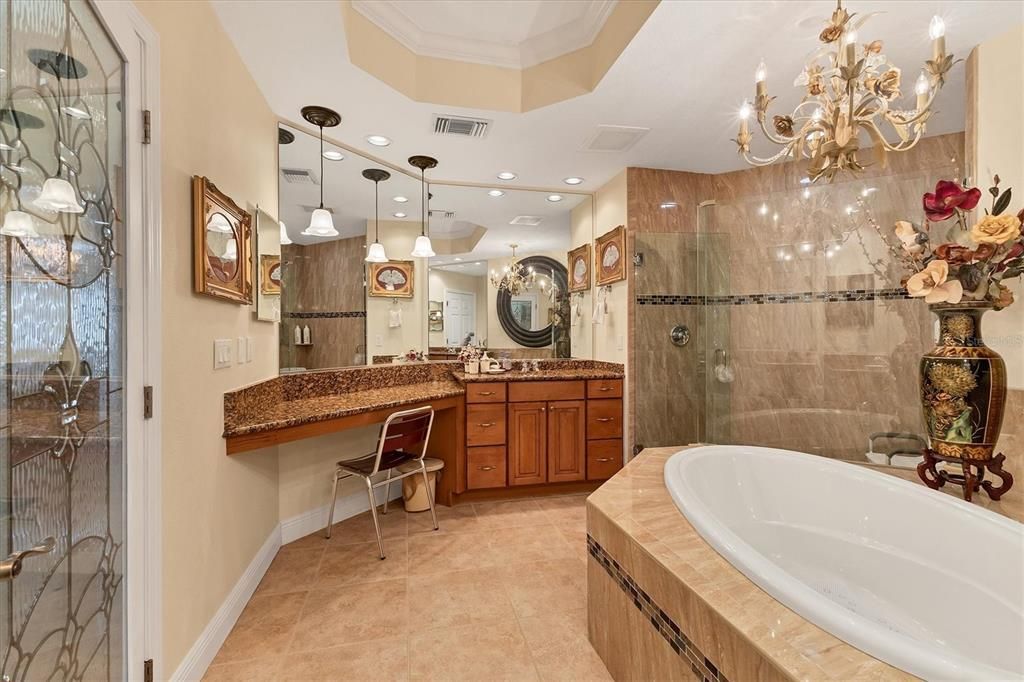 Primary Bath, Soaker Tub, separate dual , vanity and a walk in shower.