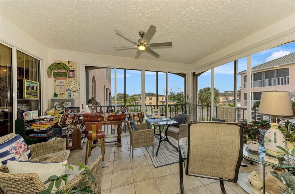 Lanai with long lake views and pool view.